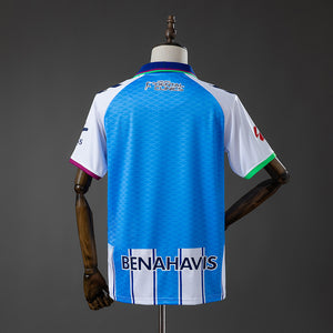 Camisa Malaga Home 4xl9 26/27
