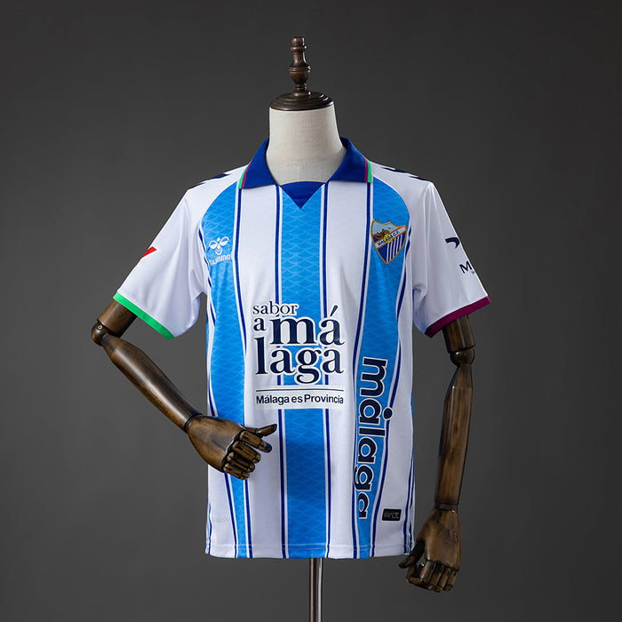 Camisa Malaga Home 4xl9 26/27