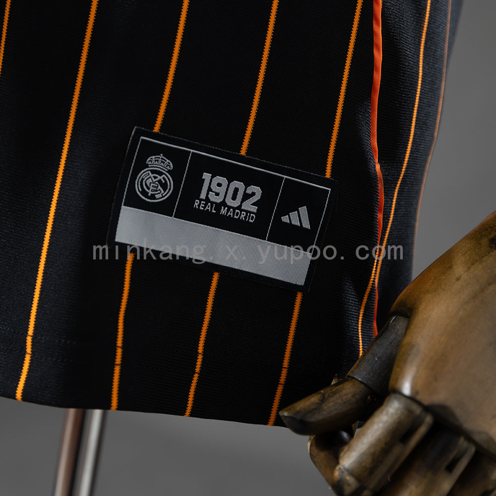 Camisa Real Madrid Listrada Preta Laranja 25/26
