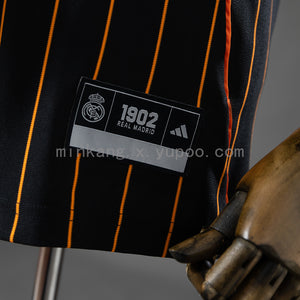 Camisa Real Madrid Listrada Preta Laranja 25/26