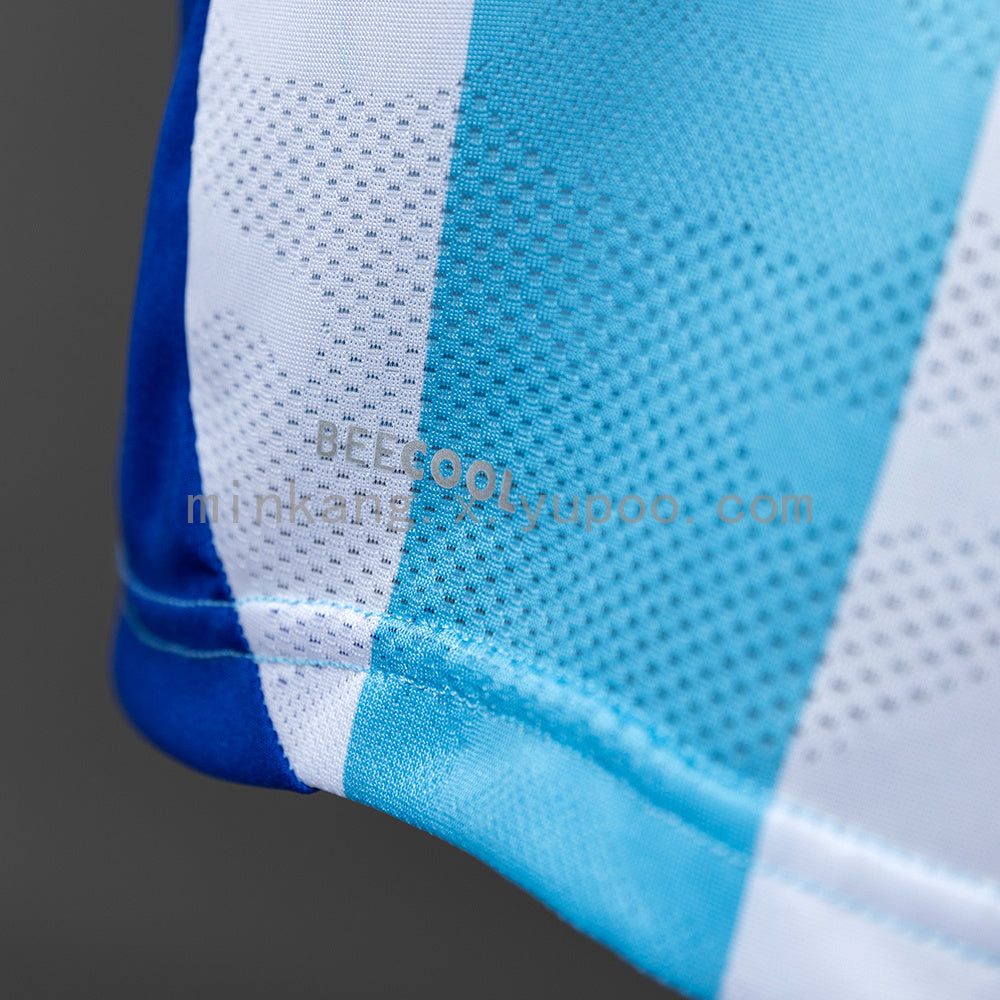 Camisa Malaga Home 4xl9 25/26